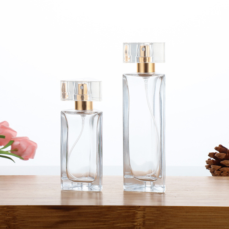 Prisma triangular único de lujo 30 ml 45 ml Botellas de vidrio de perfume vacías con tapa de pulverización de bomba y caja personalizable