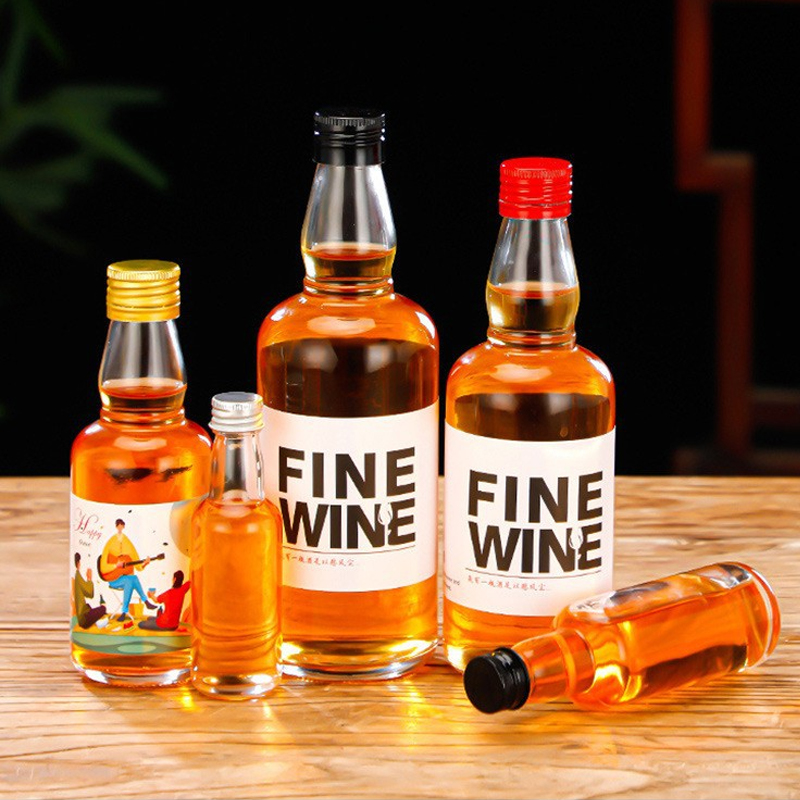 Botella de vidrio redonda al por mayor para tequila, whisky, vodka, 50 ml, 100 ml, 200 ml, 375 ml, 500 ml, botella de vidrio para licor con tapón de rosca