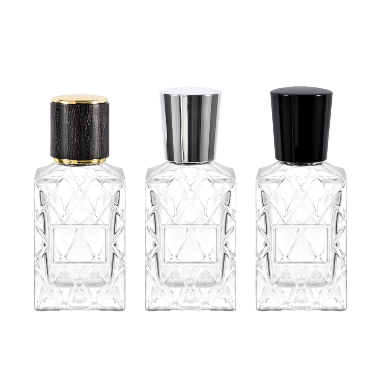 Botella de perfume de vidrio en relieve de lujo de 30 ml con tapa negra - Embalaje de botella de fragancia transparente personalizado