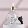 Botella cuentagotas de cristal con botella de aceite esencial de calavera vacía única de 50ml