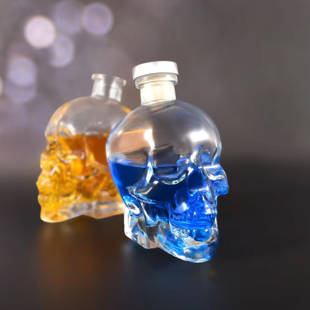 Botellas de cristal de calavera con corcho