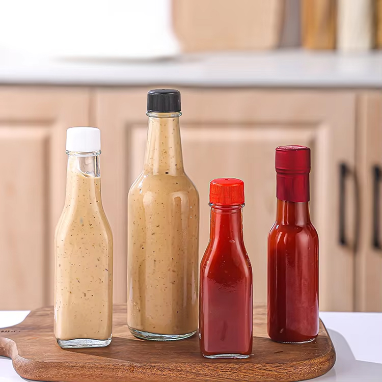 Ventas calientes Botella pequeña de vidrio 90 ml 250 ml 150 ml Botellas mareadas para vidrio de salsa picante