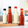 Ventas calientes Botella pequeña de vidrio 90 ml 250 ml 150 ml Botellas mareadas para vidrio de salsa picante