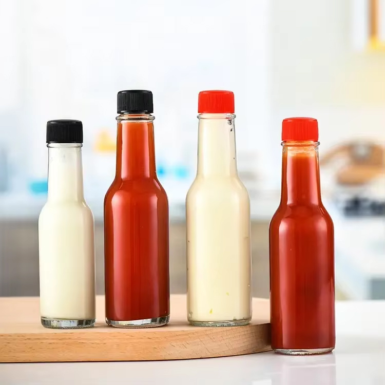Ventas calientes Botella pequeña de vidrio 90 ml 250 ml 150 ml Botellas mareadas para vidrio de salsa picante