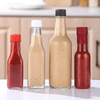 Ventas calientes Botella pequeña de vidrio 90 ml 250 ml 150 ml Botellas mareadas para vidrio de salsa picante