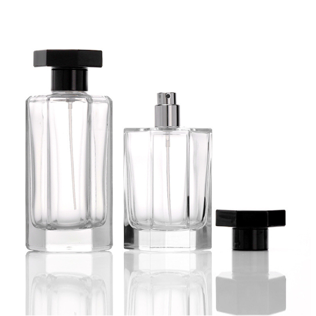 Botella de perfume hexagonal única de 50 ml y 100 ml con rociador de bomba con etiquetas personalizadas