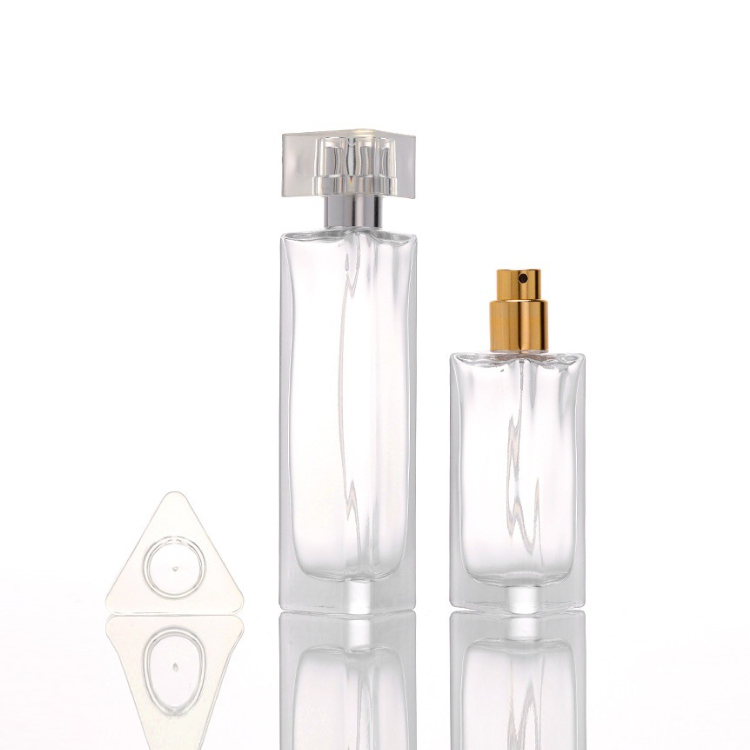 Prisma triangular único de lujo 30 ml 45 ml Botellas de vidrio de perfume vacías con tapa de pulverización de bomba y caja personalizable