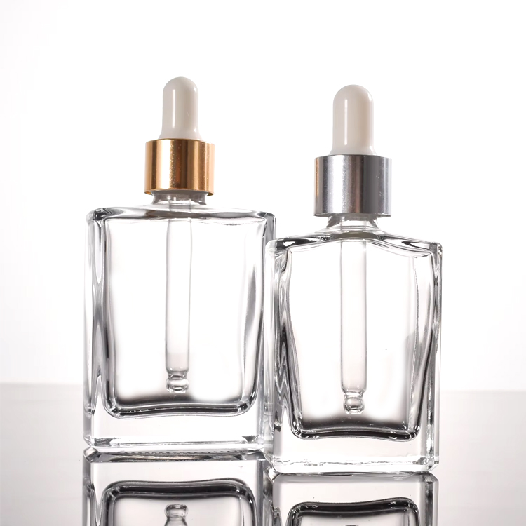 Claro de cristal de la botella del cuentagotas del perfume del aceite esencial del rectángulo cuadrado plano único claro