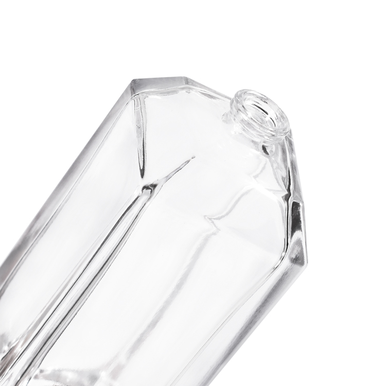 Botella de perfume de cristal facetada de lujo con tapa metálica, embalaje de fragancia premium de base gruesa